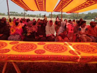Photo 2-Women with veils attended in the launching ceremoney and seated in equal position with men by breaking the barriers of conservetiveness